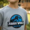 Camiseta Infantil Jurassic World Dinossauro Cinza Mescla