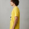 D_NQ_NP_2X_745889-MLB113242975100_072026-F Camiseta Malha PV Manga Curta Adulto Unissex Amarela Bluey Mackenzie Estampa Silk Screen Manual HQ