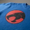 D_NQ_NP_2X_849309-MLA114863146054_082026-F-camiseta-azul-manga-curta-adulto-unissex-thundercats Camiseta Azul Manga Curta Adulto Unissex Thundercats mlc